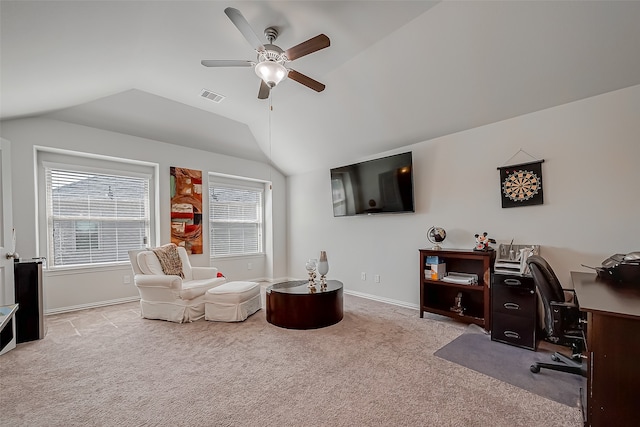 office featuring vaulted ceiling, ceiling fan, and light colored carpet