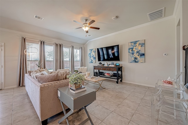 living room featuring ornamental molding, ceiling fan, and light tile patterned floors