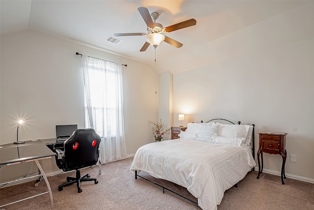 carpeted bedroom with lofted ceiling and ceiling fan