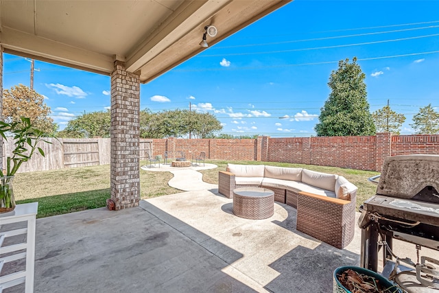 view of patio featuring outdoor lounge area and grilling area