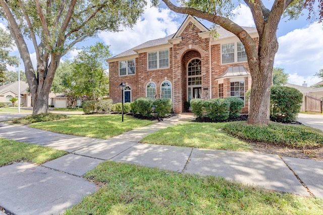 view of front of house with a front lawn