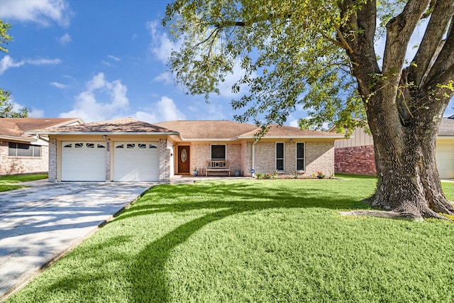 ranch-style house with a garage and a front lawn