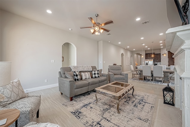 living room featuring ceiling fan