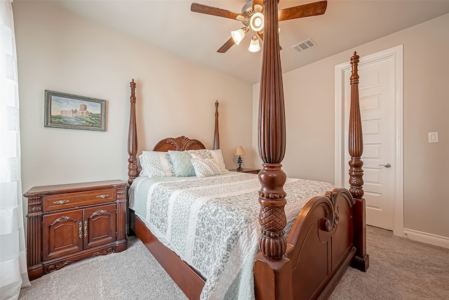 bedroom featuring ceiling fan and light colored carpet