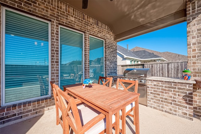 view of patio featuring grilling area and exterior kitchen