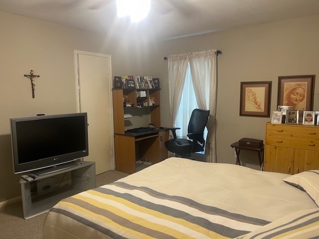 bedroom featuring carpet and ceiling fan