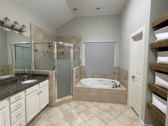 bathroom featuring tile patterned flooring, vanity, independent shower and bath, and lofted ceiling