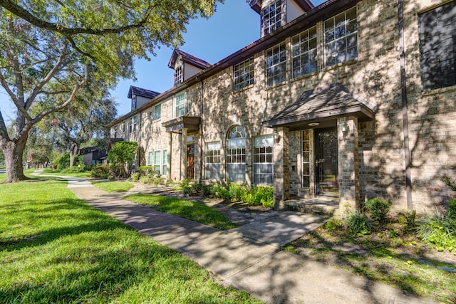 exterior space with a front yard