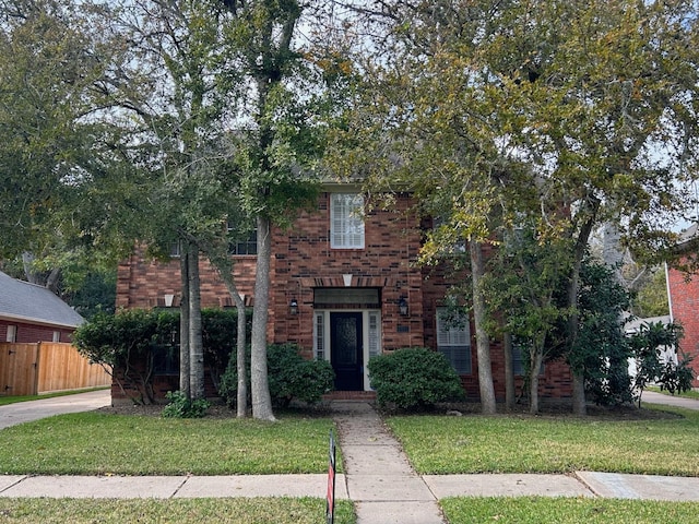 view of front facade with a front lawn