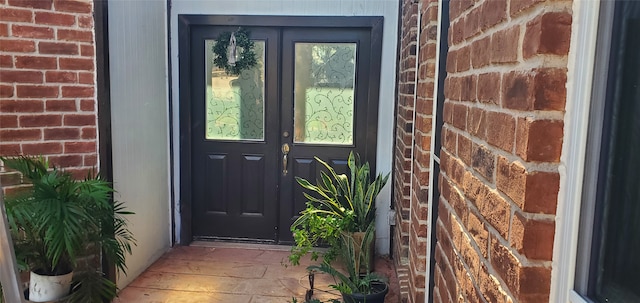 property entrance featuring french doors