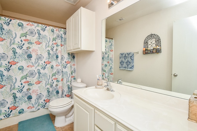 bathroom featuring vanity, tile patterned flooring, toilet, and curtained shower