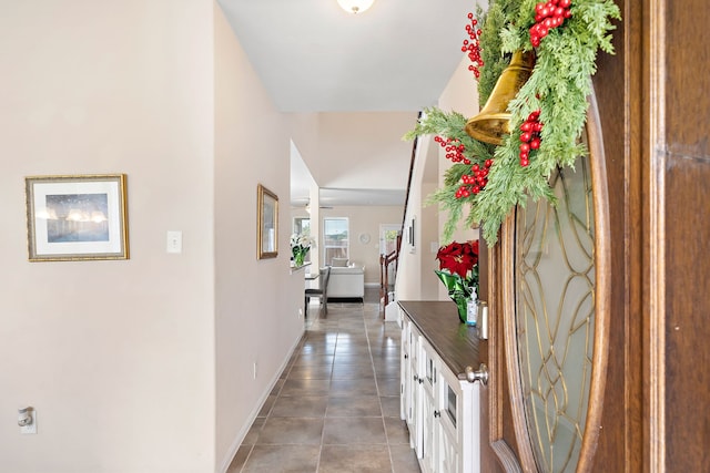 hall featuring tile patterned flooring