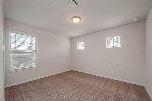 view of carpeted spare room