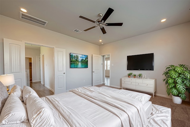 bedroom featuring ceiling fan and carpet floors