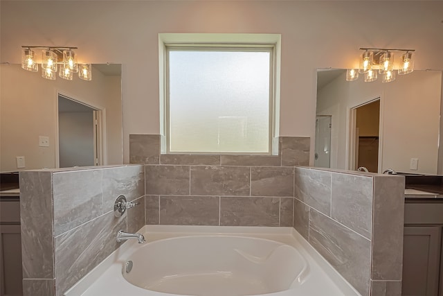 bathroom featuring a tub and vanity