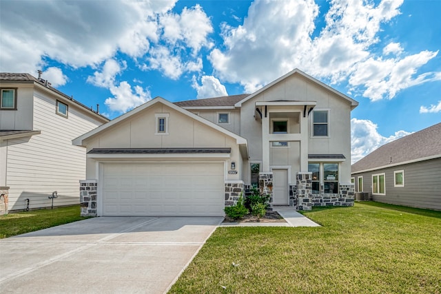 view of front of home with a front yard, a garage, and central AC