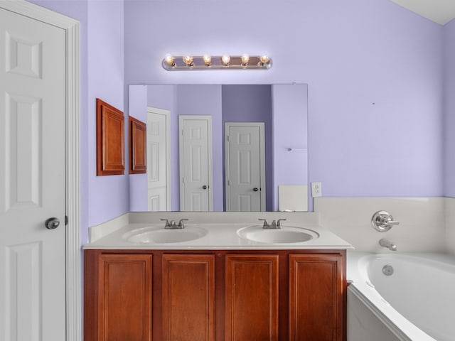 bathroom featuring vanity and a bathing tub