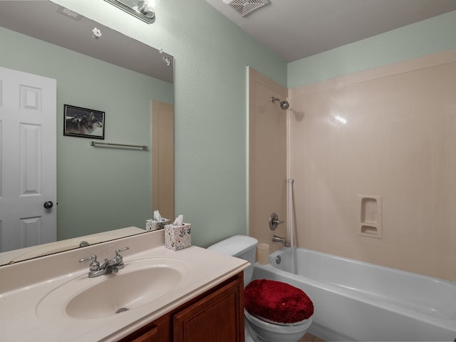 full bathroom with bathing tub / shower combination, vanity, and toilet