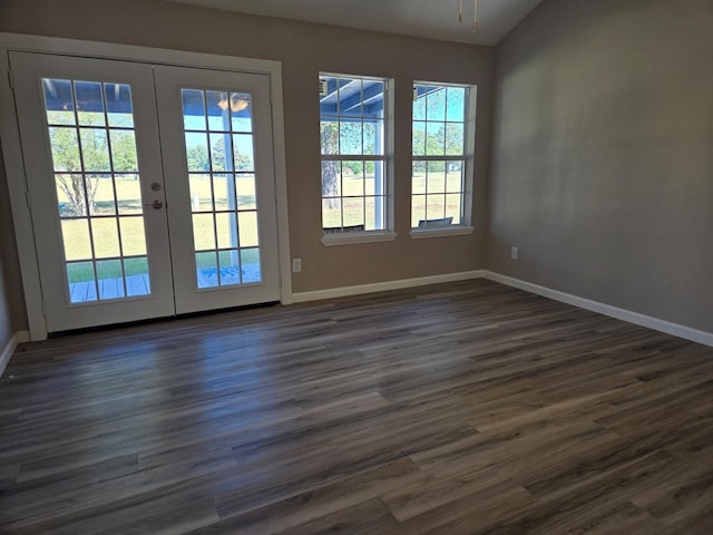 doorway to outside with french doors, dark wood finished floors, baseboards, and a healthy amount of sunlight