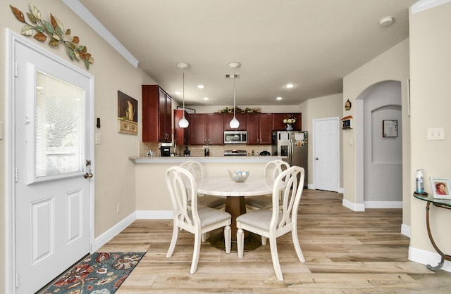 dining area featuring light hardwood / wood-style flooring