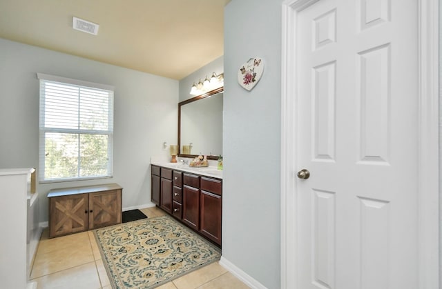 bathroom with vanity and tile patterned floors