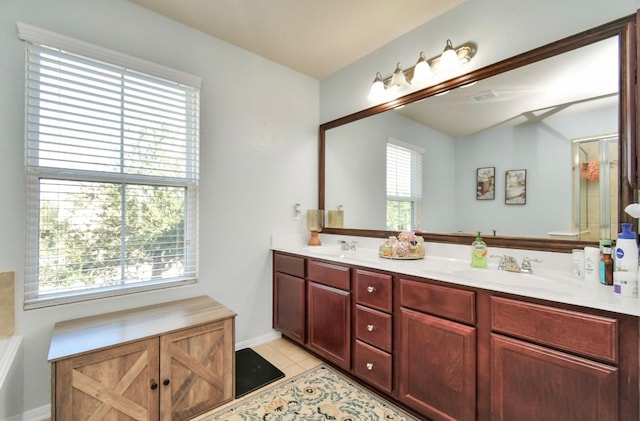 bathroom featuring tile patterned floors and vanity