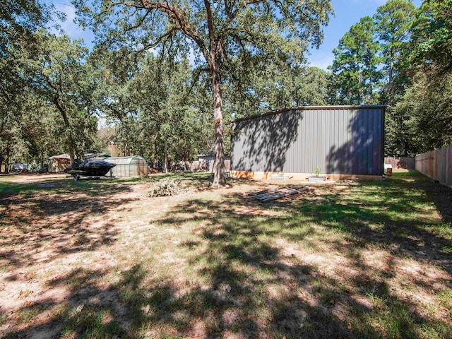 view of yard with a shed