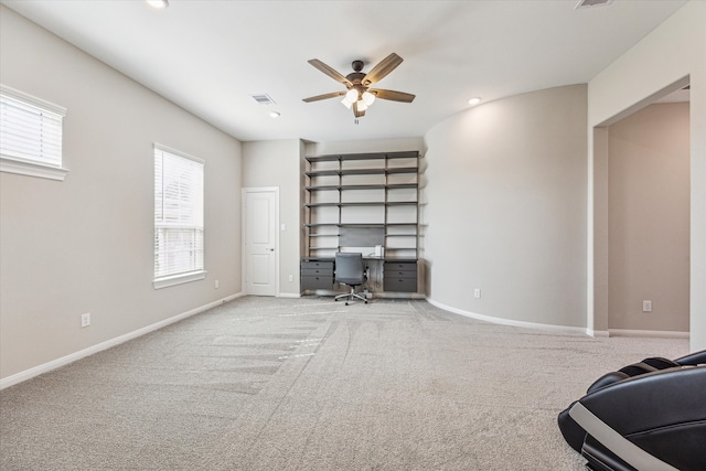 interior space featuring ceiling fan