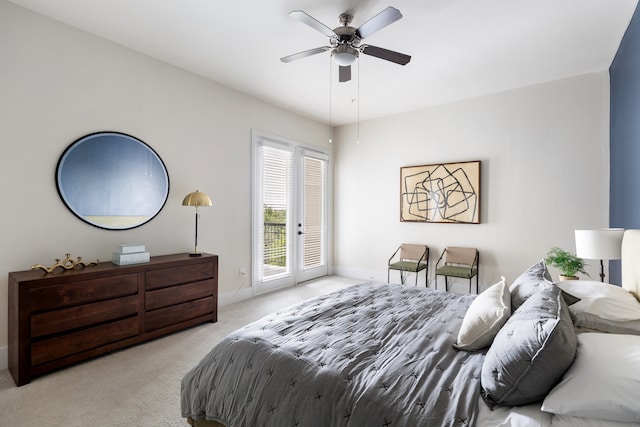 bedroom with light carpet, ceiling fan, and access to exterior