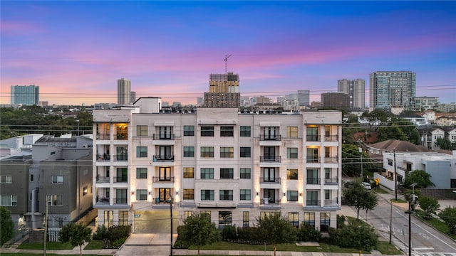 view of outdoor building at dusk