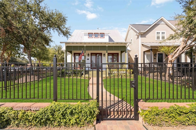 view of front of property featuring covered porch and a front yard