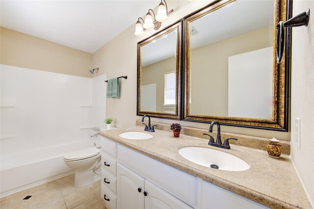 full bathroom with washtub / shower combination, toilet, tile patterned floors, and vanity