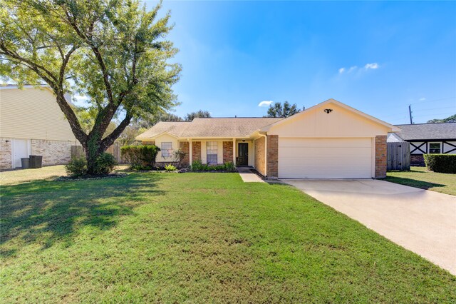 single story home with a front lawn and a garage