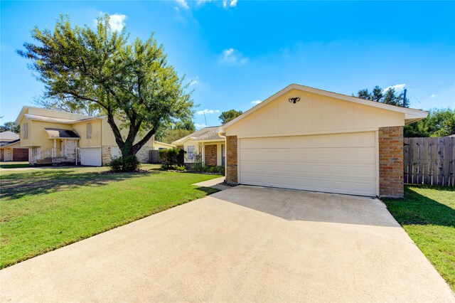 single story home featuring a front yard