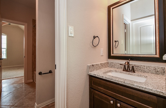 bathroom with vanity and tile patterned floors