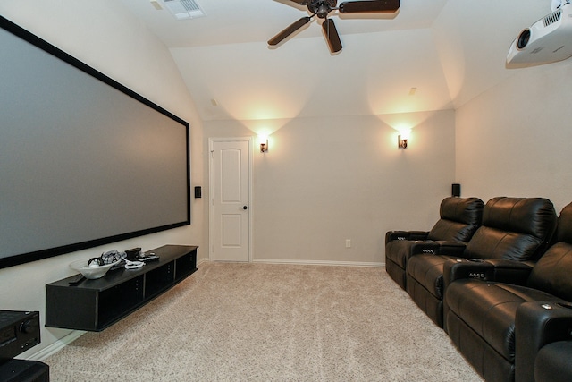 home theater room featuring vaulted ceiling, ceiling fan, and light colored carpet