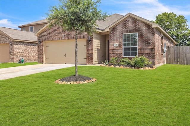 view of front of house featuring a garage and a front lawn