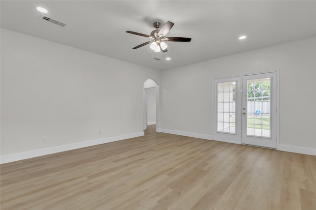 unfurnished room with ceiling fan and light hardwood / wood-style flooring