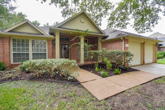 ranch-style home featuring a garage