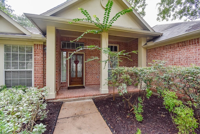 property entrance with covered porch