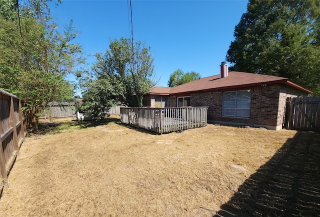 view of yard featuring a deck