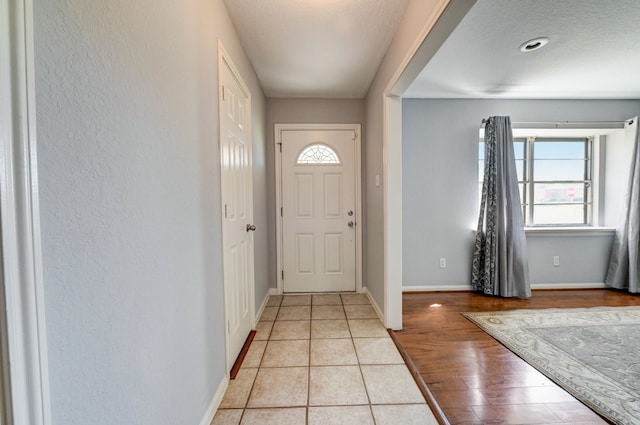 view of tiled foyer entrance