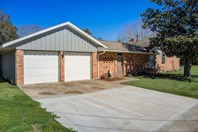 ranch-style home with a front yard and a garage