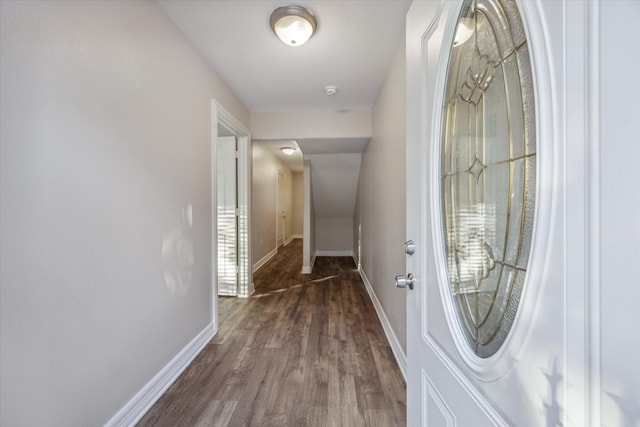 hall featuring dark wood-type flooring