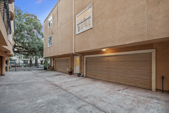 view of property exterior with a garage