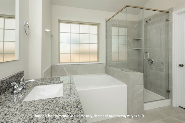 bathroom with separate shower and tub, sink, and tile patterned floors