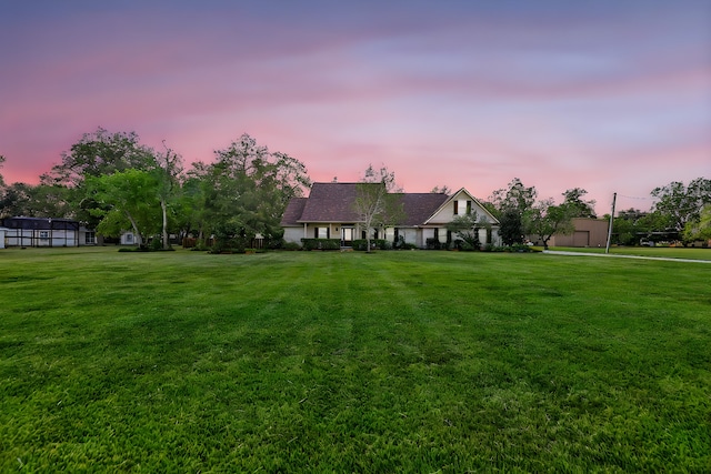 tudor home with a yard