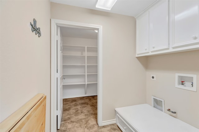 clothes washing area with hookup for a washing machine, hookup for an electric dryer, and cabinets