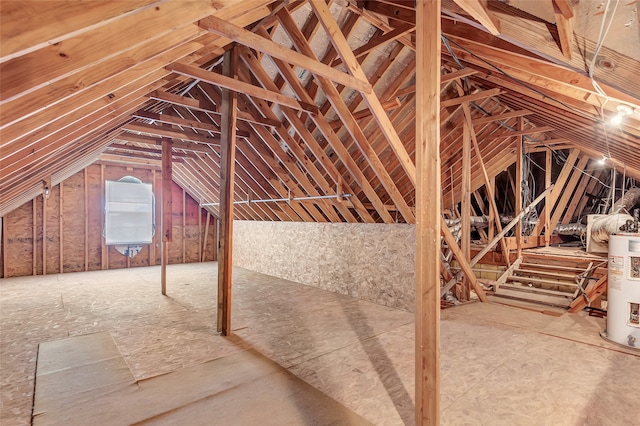 unfinished attic with electric water heater