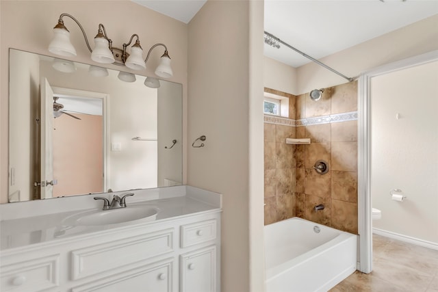 full bathroom with vanity, tiled shower / bath combo, toilet, and tile patterned floors